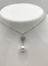 Collana in oro con perle e diamanti